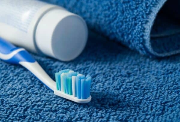 Toothbrush and toothpaste